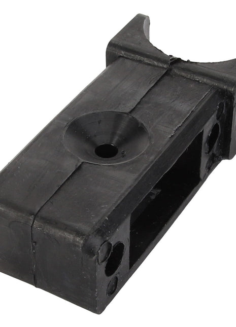 The AGCO Bracket - 112367434300 is a sleek black rectangular piece made of plastic or rubber, featuring a central hole and various mounting points, potentially a key component of a mechanical or electronic device.