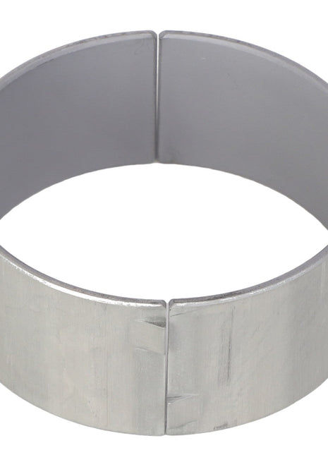 The AGCO Bearing - V836179783 by AGCO is a metal cylindrical sleeve with an open seam and a smooth finish, offering a refined touch to your projects. No current product description available.