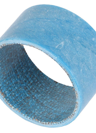 A blue cylindrical AGCO bushing, model Acx2476000, featuring a textured inner bearing surface.