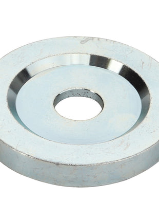 The AGCO Spacer - Acw0444970 is a metallic flat washer with a central hole and a slightly beveled inner edge. No additional product description information is available at this time.