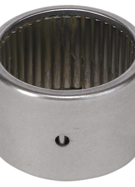 Close-up of a metallic AGCO Needle Roller Bearing (Model KS5045) with internal rollers visible and a hole on the outer casing. This high load capacity bearing, featuring a small cross-sectional area, appears to be unused.