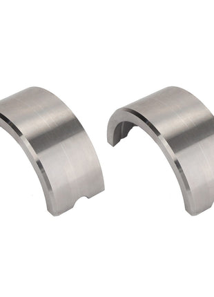 Two metallic semi-circular bearing shells are shown side by side on a plain background. Note: No current product description is available for AGCO | Bush - Acp0368990 by AGCO.