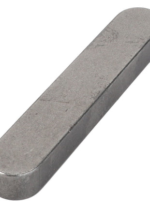A rectangular metal object with rounded edges, resembling a key for mechanical or automotive use. Product Name: AGCO | KEY - D43108000 by AGCO. Product description not available.