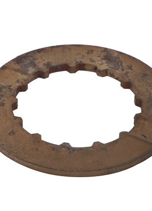 A weathered, flat, circular metal plate with a jagged inner hole, possibly a gear or mechanical part; contact our support team for more details about the AGCO | SHIM - 0.010.0630.0 from AGCO.