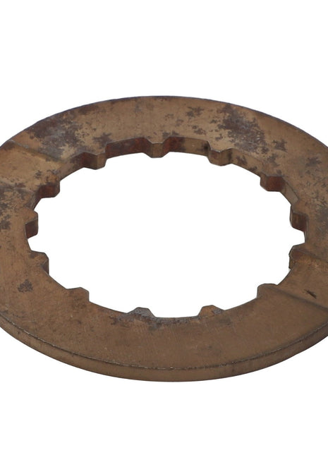 A weathered, flat, circular metal plate with a jagged inner hole, possibly a gear or mechanical part; contact our support team for more details about the AGCO | SHIM - 0.010.0630.0 from AGCO.