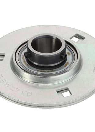 Introducing the AGCO | BEARING - D41713601: A circular metal bearing assembly featuring various engravings and a central cylindrical component, specifically designed to facilitate rotational movement.