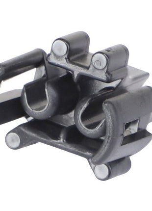 Close-up of the AGCO WIRE LOCK (AG520752), a black plastic fastener clip featuring two parallel slots and protruding side tabs, designed for secure attachment.
