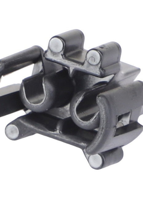 Close-up of the AGCO WIRE LOCK (AG520752), a black plastic fastener clip featuring two parallel slots and protruding side tabs, designed for secure attachment.