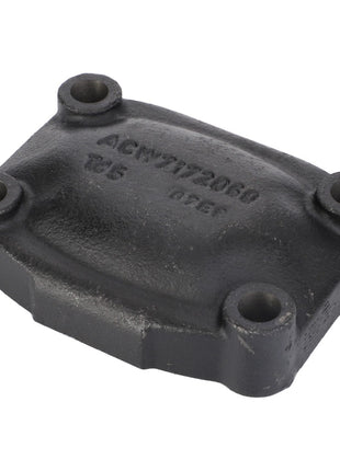 Close-up of the AGCO Cover for Cylinder Head (Acw7172060), a black, rectangular mechanical part featuring four bolt holes and embossed text on its surface.