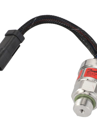 The AGCO Transducer, Engine Harness - Acw1881190 is a metal pressure sensor featuring a black braided wire and a plastic connector. The sensor has a red label indicating its specifications. Currently, no additional product description information is available.