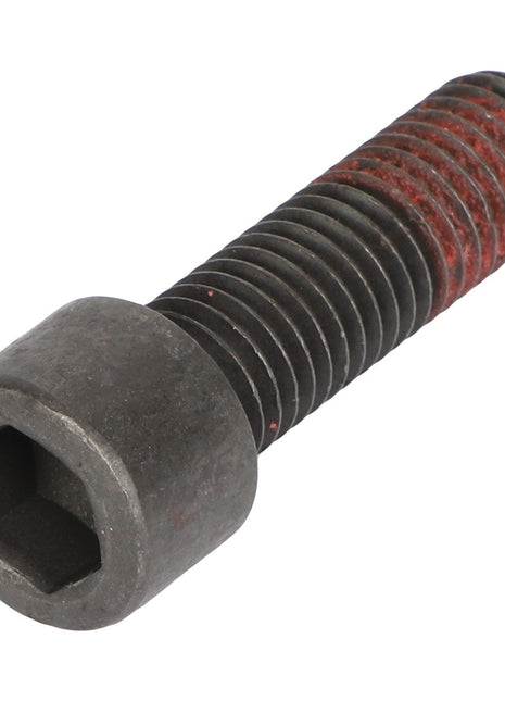 A close-up view of the AGCO Hex Socket Head Capscrew - 3016532X1, featuring a black finish and red thread locker applied to the threads. No current product description is available.