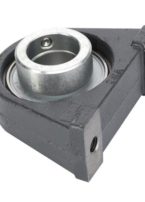 The AGCO Bearing and Housing Assembly - D41715800 features a gray cast steel bearing housing with a circular hole and mounting holes on two sides.