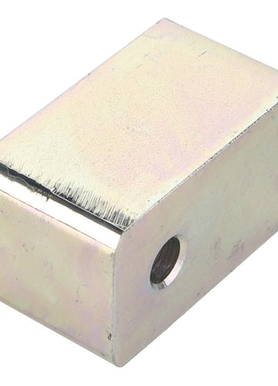 The AGCO Spacer, model ACW2041340, is a rectangular metallic block featuring a hole on one side and rough edges; no current product description information is available.