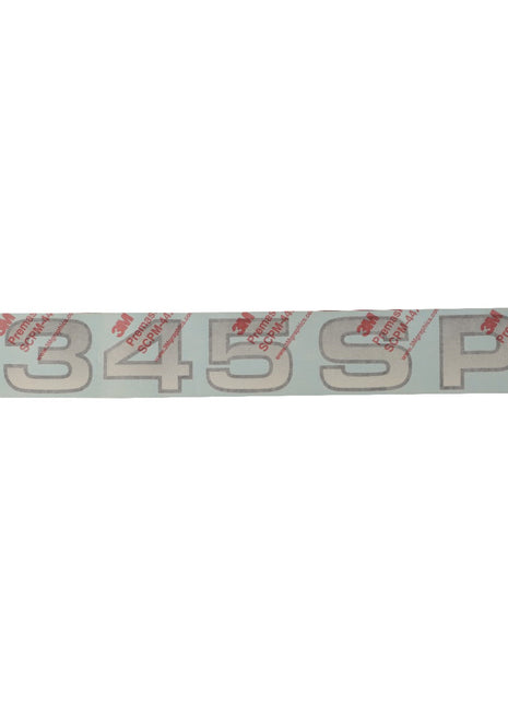 A strip of reflective numbers and letters "7345 SPL" in large print on a protective film, listed under the product name AGCO | Decal - Acw1734540 by the brand AGCO. Unfortunately, no additional current product description information is available.
