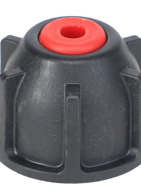 Close-up of the AGCO | CAP - AG427072, a black plastic knob with a red center hole, featuring vertical ridges around its sides, compatible with Pentair Hypro systems.