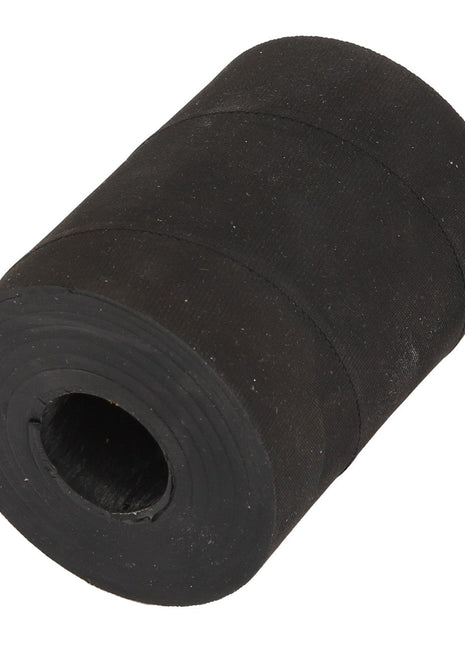 A cylindrical, black rubber roller with a hollow center, identified as the AGCO Bush - Acw497334A, is displayed on a white background. No additional product description information is available.