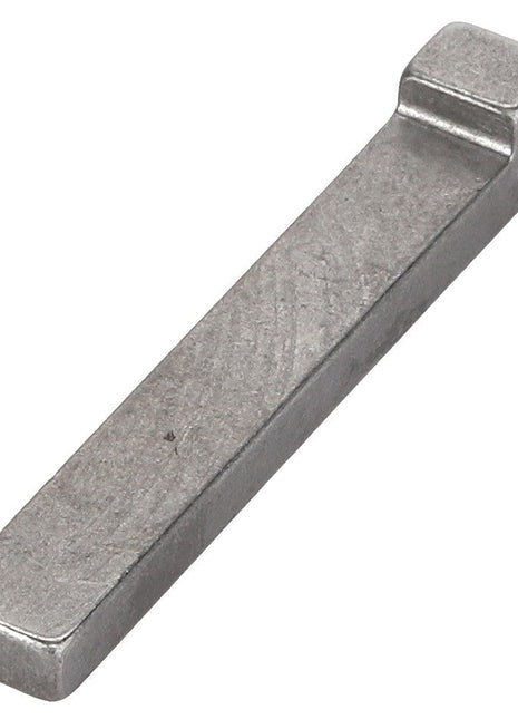 The AGCO GIB Key - D43154300 is a rectangular, metallic key designed with a small notch on one end, typically used in machinery for aligning components or locking parts together. Currently, no product description information is available.
