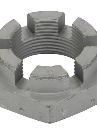 Close-up of an AGCO | Nut - Acw0433070, a metal castellated nut with grooves used in mechanical applications to prevent loosening. The hexagonal-shaped nut features a cylindrical hole in the center. No current product description information available.