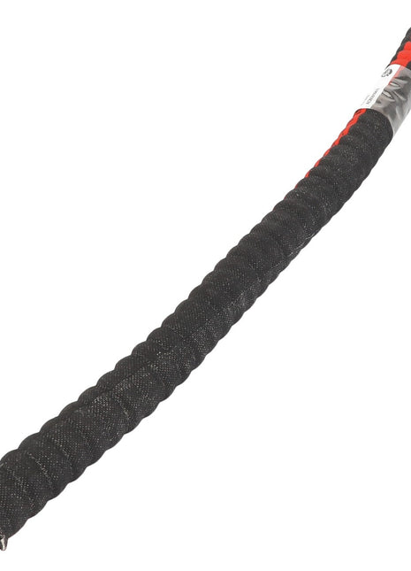 A coiled black protective sleeve, partially covering a red wire with an attached label marked "AGCO | Compressor Hose - Acw2016470".