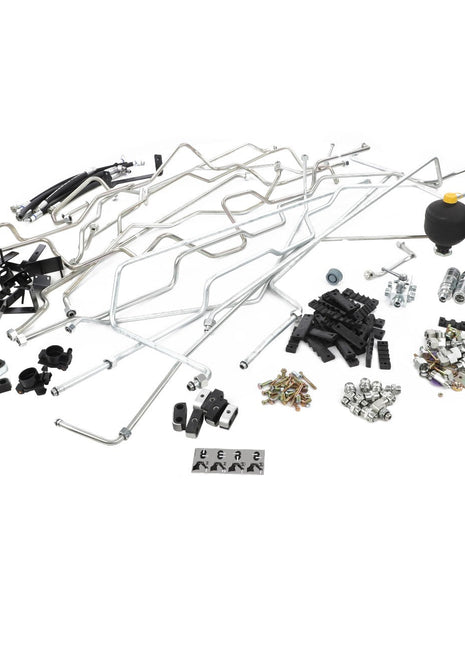 An assortment of AGCO automotive parts, including the Kit, Pipe - Acw1145240 and various tubes, fittings, clamps, and electrical components are arranged on a white background. Please note that no current product description information is available.