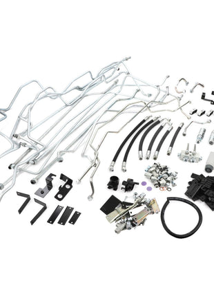 A collection of various automotive parts, including metal pipes, hoses, bolts, brackets, and other components arranged on a white background. This is the AGCO Hydraulic Kit - Acp0634080 by AGCO. No product description available.