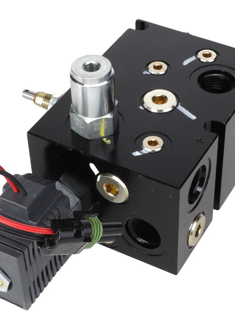 A black AGCO control valve block, model AG132504, featuring multiple ports and attached electrical wiring. No current product description information is available.