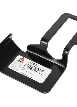 A black metal bracket with a rectangular cutout and a label displaying "AGCO | PLATE - AL5220032," "APCOPARTS.COM," and other essential information.