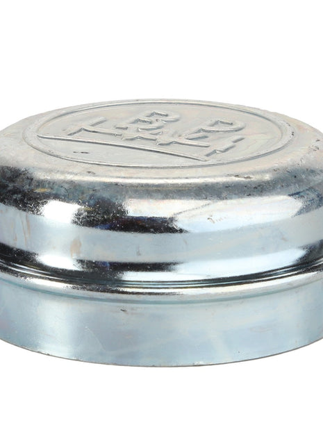 AGCO | CAP - D46743700: A shiny, metallic bearing dust cap from AGCO featuring an embossed logo on the top. Detailed specifications are currently unavailable.