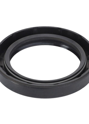 The AGCO | Gasket, Gearbox - D45409700 is a circular black rubber oil seal with a visible metal spring at the inner edge, designed to prevent leaks in machinery and ensure high-performance demands in manufacturing consistency.