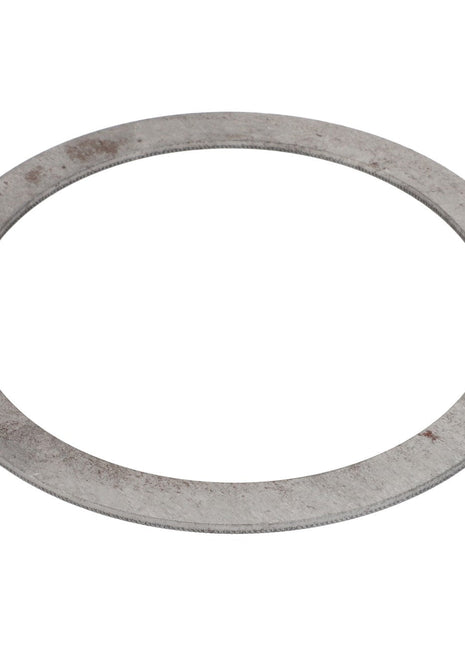 A flat, circular AGCO Adjusting Washer (Acp0369170) with a large central hole and a slightly worn surface, reminiscent of countless uses over time.