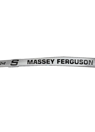 A curved silver emblem featuring the text "Massey Ferguson" and "7724" in black, accompanied by a stylized "S" logo. This item is listed under the product name AGCO | Decal - Acw3587370 from the brand AGCO. No current product description information available.
