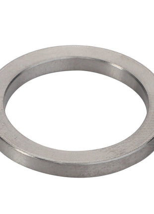 A flat, circular metal washer with a round central hole: AGCO | Disc - F119200710350 by AGCO. No current product description available.