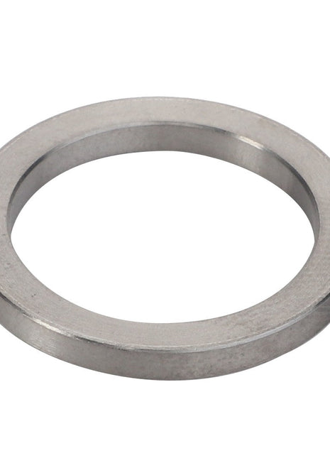 A flat, circular metal washer with a round central hole: AGCO | Disc - F119200710350 by AGCO. No current product description available.