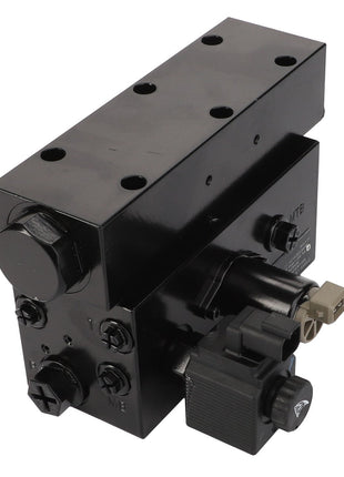 The AGCO Trailer Brake Valve - Acw384363C is a black hydraulic control valve featuring various knobs, fittings, and connection ports. It has a rectangular body with multiple screw holes on top. No current product description information is available.