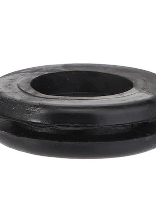 Close-up image of the AGCO Grommet - La10396480 with a central hole and a circular shape, in black rubber. No Product Description Available.