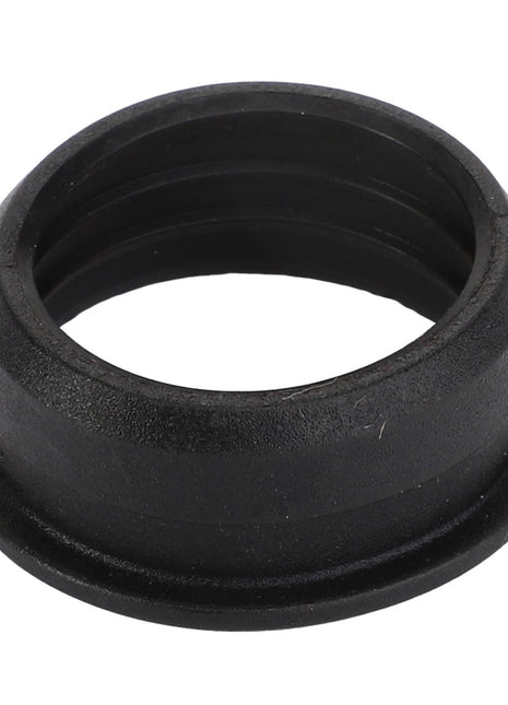 The AGCO | Gasket - Acp0691570 from AGCO is a black rubber grommet featuring a grooved exterior and a hollow center, commonly used for insulating or protecting cables that pass through metal plates. It is available in various sizes to meet different needs.