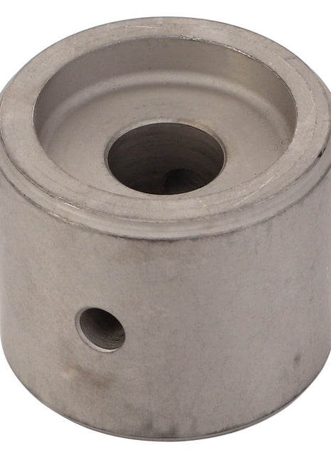 AGCO | Pivot - F119200210960 is a cylindrical metal component featuring a central hole and a smaller side hole. No current product description available.