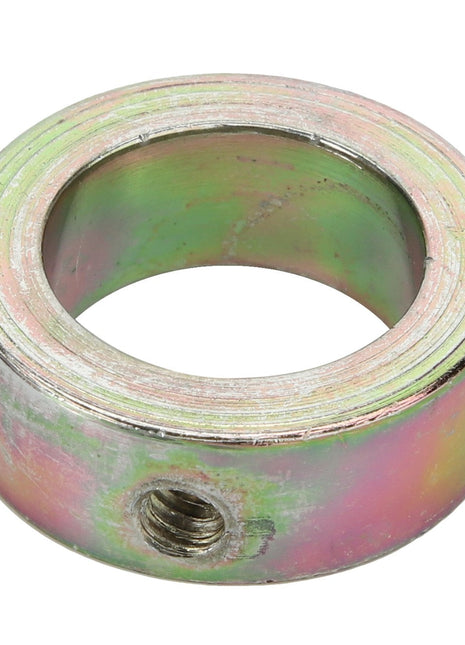 A round, metallic ring with a threaded hole in its side, featuring a multicolored, slightly iridescent surface. Product Name: AGCO | BUSH - D28270233 by Brand Name: AGCO.