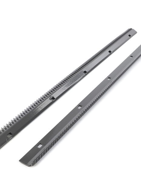 On a white background, two AGCO Pair Of Bars - La311206901 by AGCO are shown side by side, featuring evenly spaced teeth and rectangular holes.