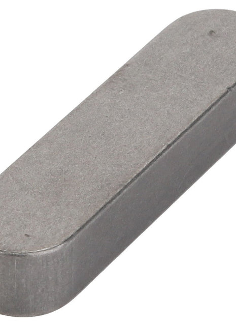 A sleek, rectangular metal object with rounded edges, resembling a small, flat bar. This item is known as the AGCO | KEY - D43106400 and is manufactured by AGCO.