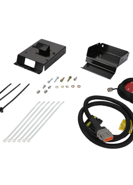 The AGCO Telemetry Kit - Acw066791A includes various components such as mounting brackets, zip ties, bolts, an electrical cable with connectors, and a circular red component.