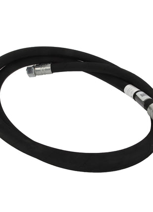 The AGCO | COOLER HYDRAULIC HOSE - ACP0532900, featuring a coiled black rubber design and metal fittings at both ends, is displayed against a white background.