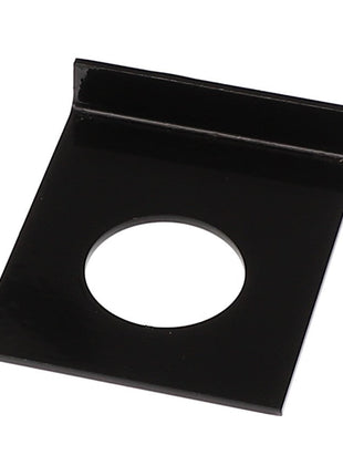 The AGCO RETAINER - E66728 is a black, rectangular metal plate featuring a circular hole in the center and a raised edge on one side.
