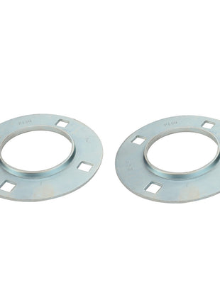 Two AGCO Bearing Flange - Acw1052970 round cast steel flanges with central holes and four square cutouts evenly spaced around the perimeter, placed side by side against a plain white background.