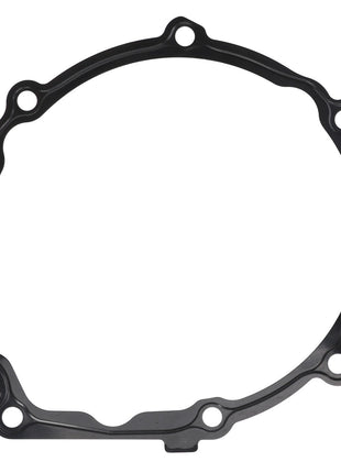 The AGCO Gasket - F530200050410 is a black metal gasket featuring multiple bolt holes arranged around its perimeter.