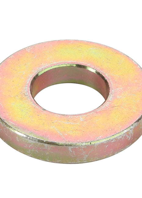 Close-up of the AGCO spacer, model D28280981, showcasing a central round hole with a slightly worn metal surface and a yellowish tint. No current product description information is available.