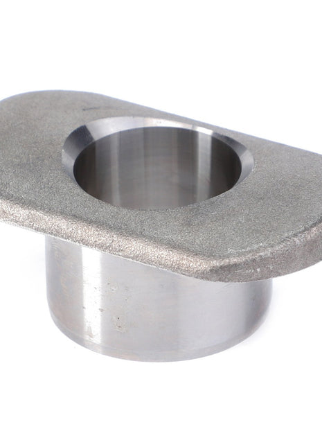 A metal cylindrical object with a flanged top and a central hole, likely the AGCO Coupling Bolt Bush, Automatic Clevis (F816500070010), an authentic hitch component part for machinery or equipment.