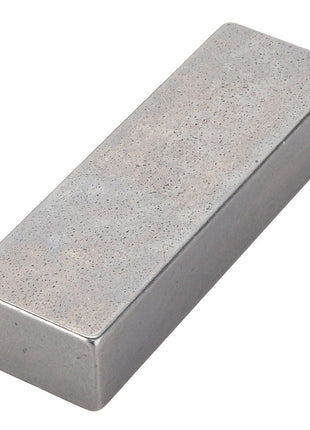 A rectangular, metallic ingot with a smooth, polished surface, branded under AGCO as the Parallel Key - Acp0443680.