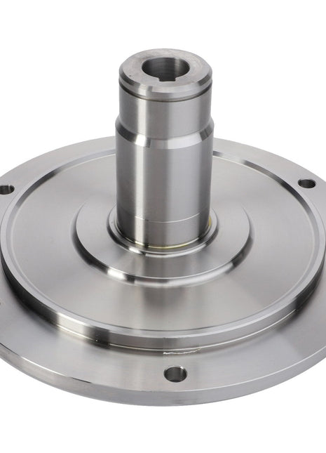 The AGCO Flange Hub - Fel140794 is a metallic mechanical component featuring a circular base and a cylindrical shaft extending from its center. The base has several evenly spaced holes around its perimeter. Currently, there is no additional product description available for this part.