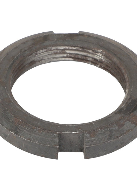 The AGCO NUT - 1132990 is a metal locking nut featuring four notches around its edge. No further product description is available.